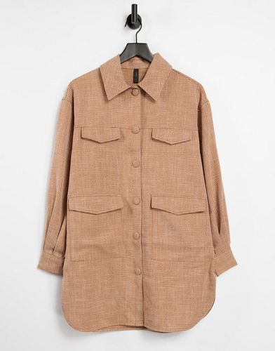 longline shirt with pocket detail in tan