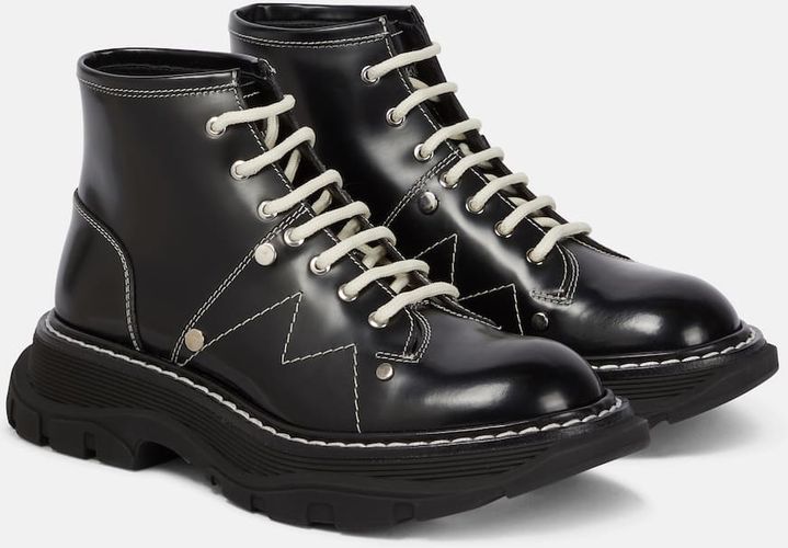 Tread patent leather ankle boots