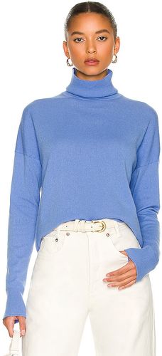 Karenia Turtleneck Sweater in Blue. Size L, M, S.