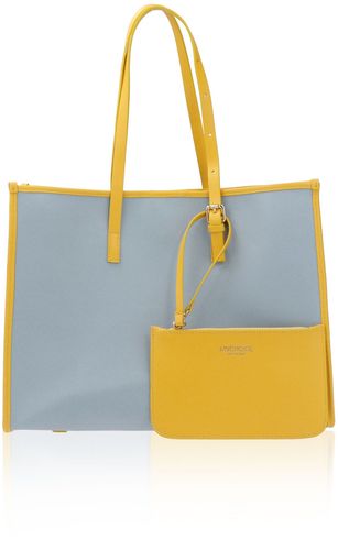 Shopping bag con profili in pelle