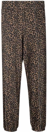 Pantaloni affusolati con stampa leopardata in marrone - uomo